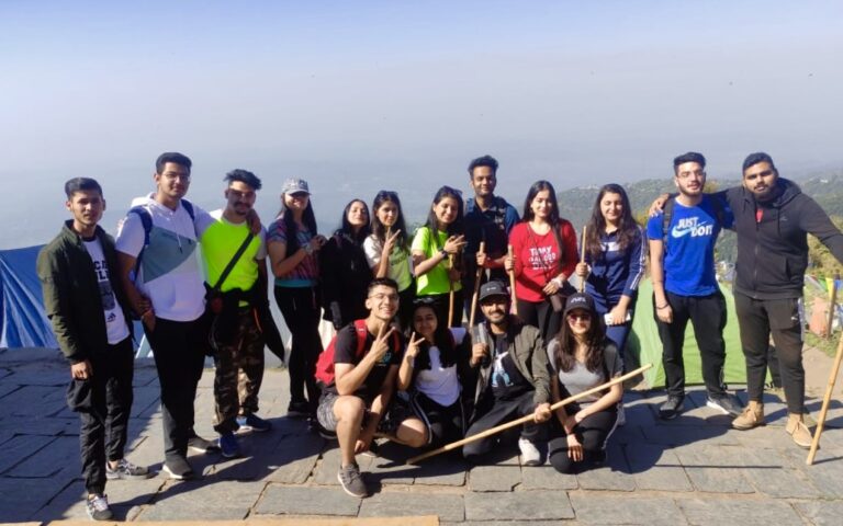 Trekking group on a mountain trail near Dharamshala