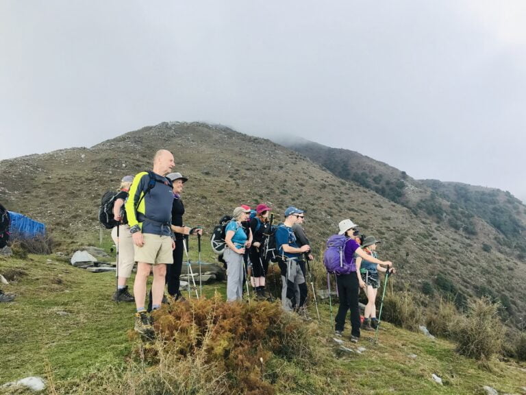 a group of people hiking on a mountain