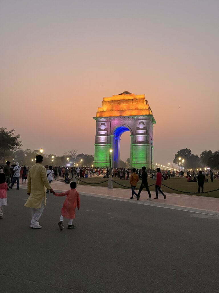 Golden Triangle Tour with Ranthambore Safari 4 India Gate illuminated in tricolour lights during evening hours in New Delhi