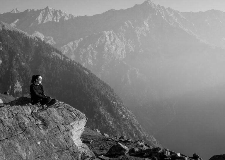 Home 6 Hiker overlooking the Dhauladhar mountains near Dharamshala