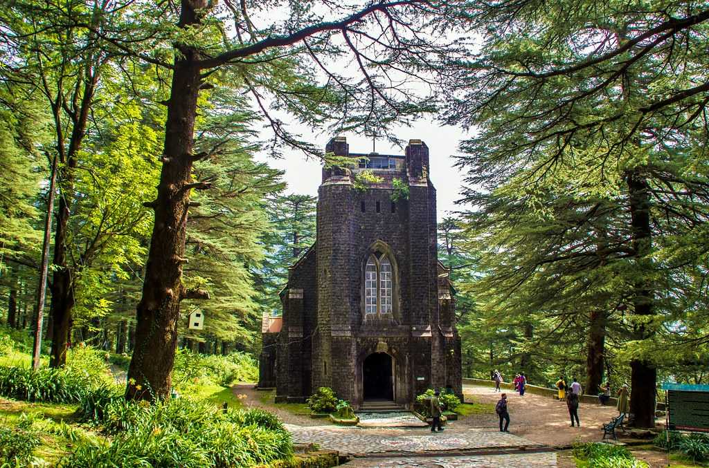 St John in the Wilderness Church framed by deodar trees near McLeodganj