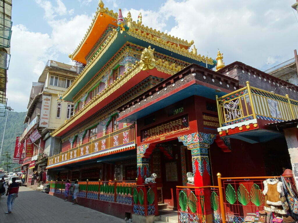Take a Trip to McLeodGanj: A Guide to the Best Things to Do 4 Colorful Tibetan Buddhist temple on Main Street in McLeod Ganj, Dharamshala, reflecting vibrant Himalayan and Tibetan architecture