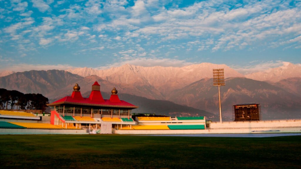 Is Dharamshala worth visiting ? 3 HPCA Cricket Stadium in Dharamshala with snow-capped Dhauladhar mountains, Himachal Pradesh