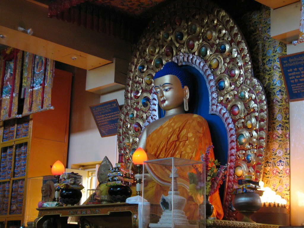 a statue of a buddha in a Dalai lama temple Mcleodganj