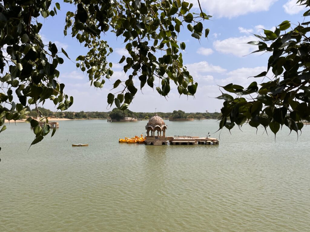a small structure on a floating platform in a lake