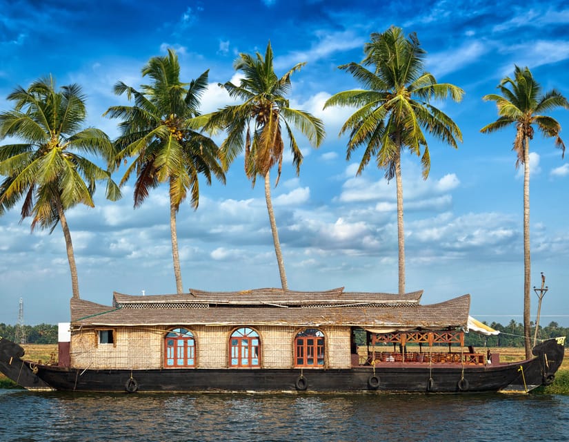 a boat on the water with palm trees