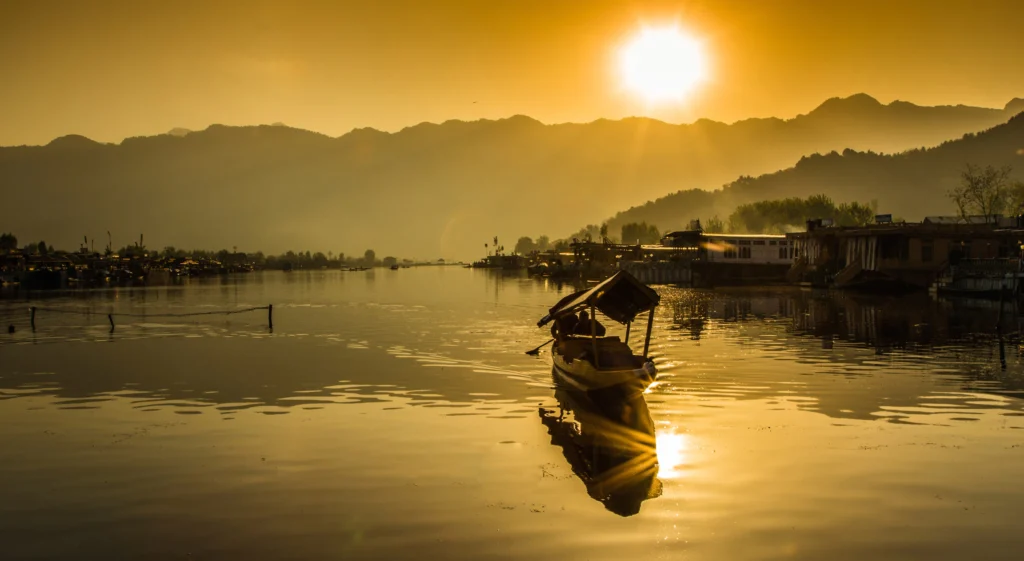 All-India Tours & Treks 2026: Explore the Best of India with Manu Adventures 5 Sunset on Dal Lake with a traditional shikara boat and mountain reflections in Srinagar Kashmir