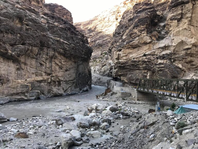 Mountain river gorge and bridge near Nako