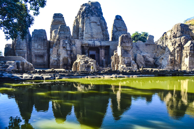 Masrur Rock Cut Temple in Kangra, Himachal Pradesh reflecting in the water
