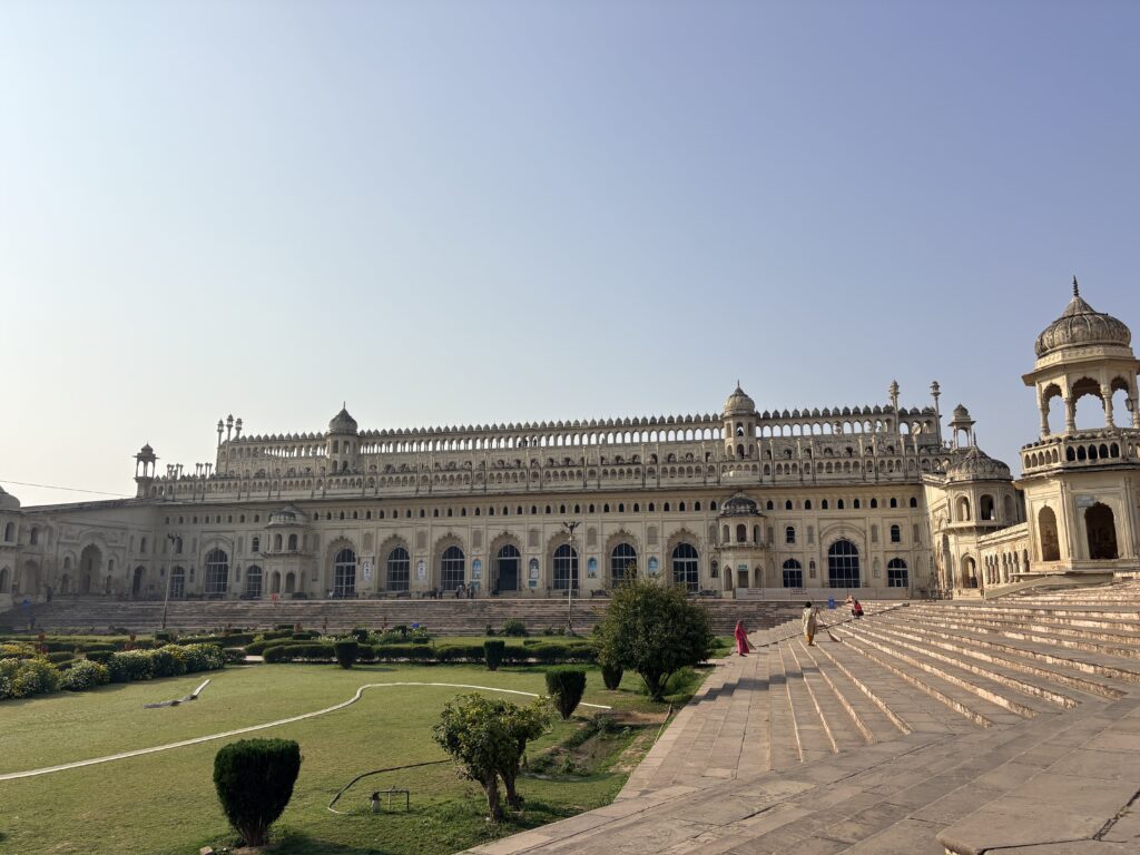 Bara Imambara in Lucknow with an arched facade, landscaped courtyard and stone steps