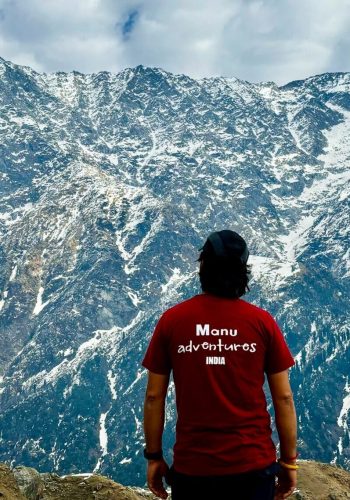 a man standing on a mountain