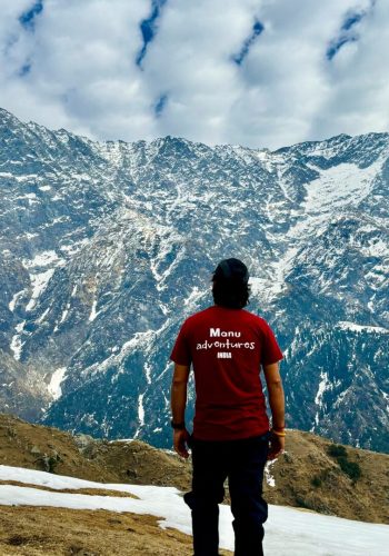 a man standing on a mountain