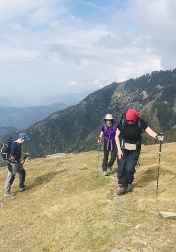 a group of people hiking on a mountain